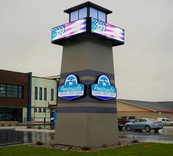 Multi-facet outdoor business sign.